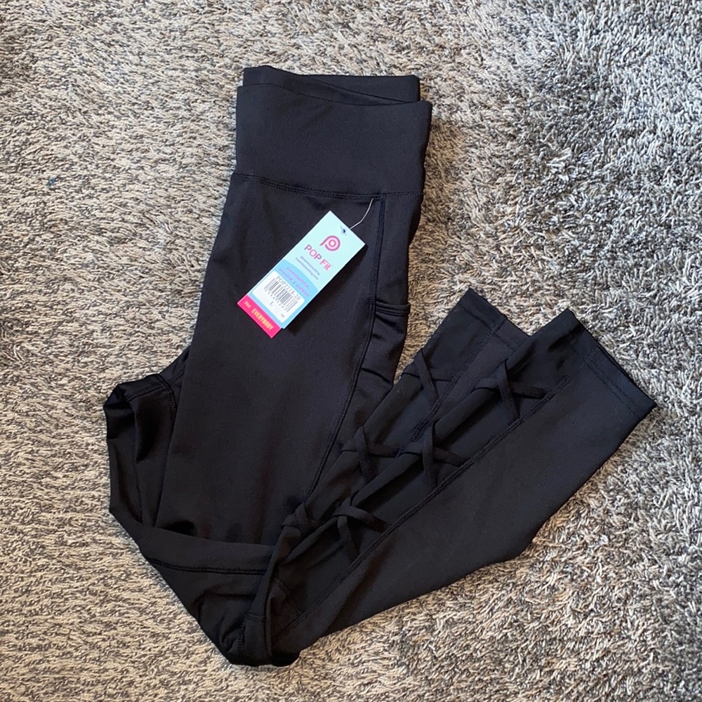 black leggings with cross cross pattern never worn